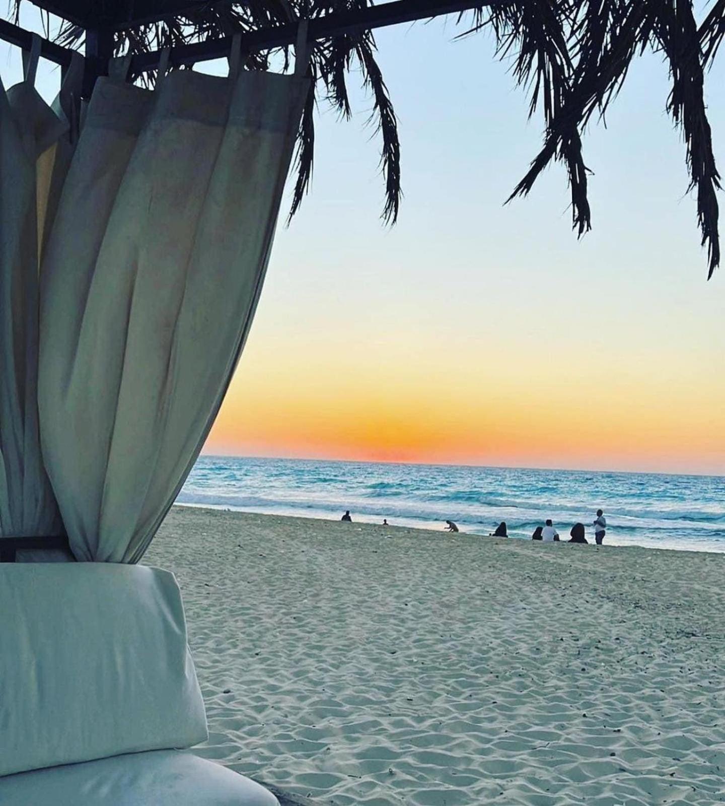 ボルグ エル アラブ ビーチ ホテル ボルグ・エル・アラブ エクステリア 写真 Sunset at the beach