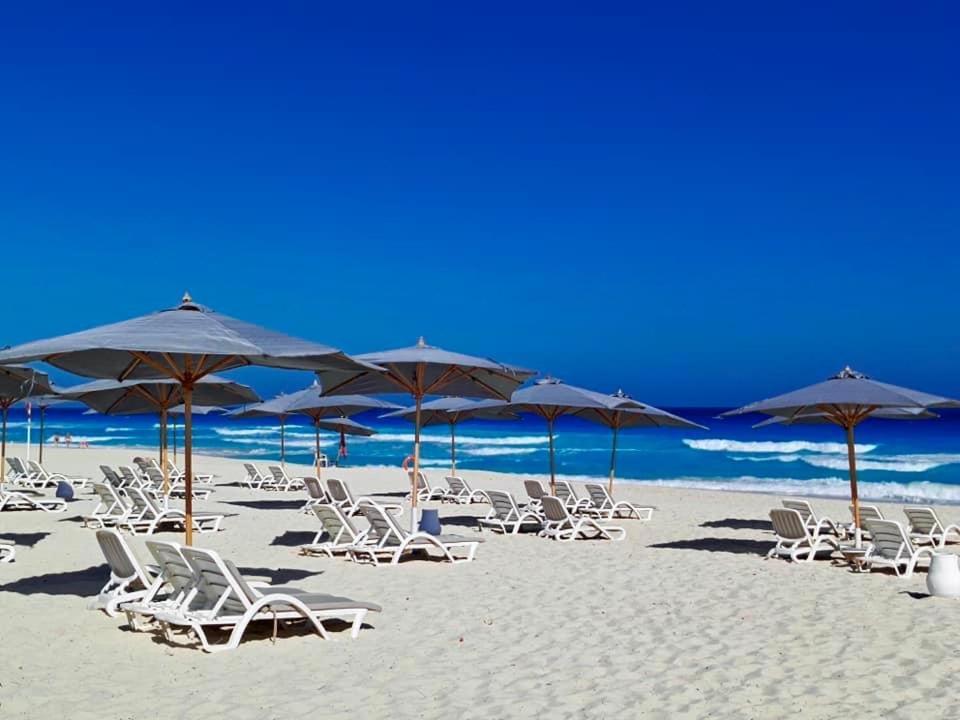 ボルグ エル アラブ ビーチ ホテル ボルグ・エル・アラブ エクステリア 写真 Beach at the Grand Palladium Hotel