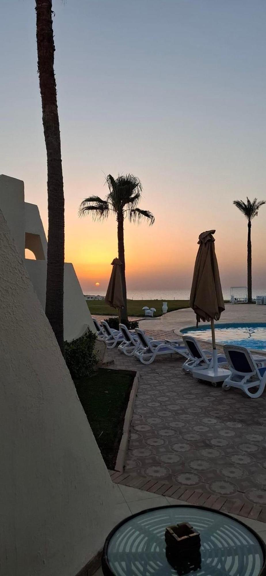 ボルグ エル アラブ ビーチ ホテル ボルグ・エル・アラブ エクステリア 写真 Sunset at the hotel